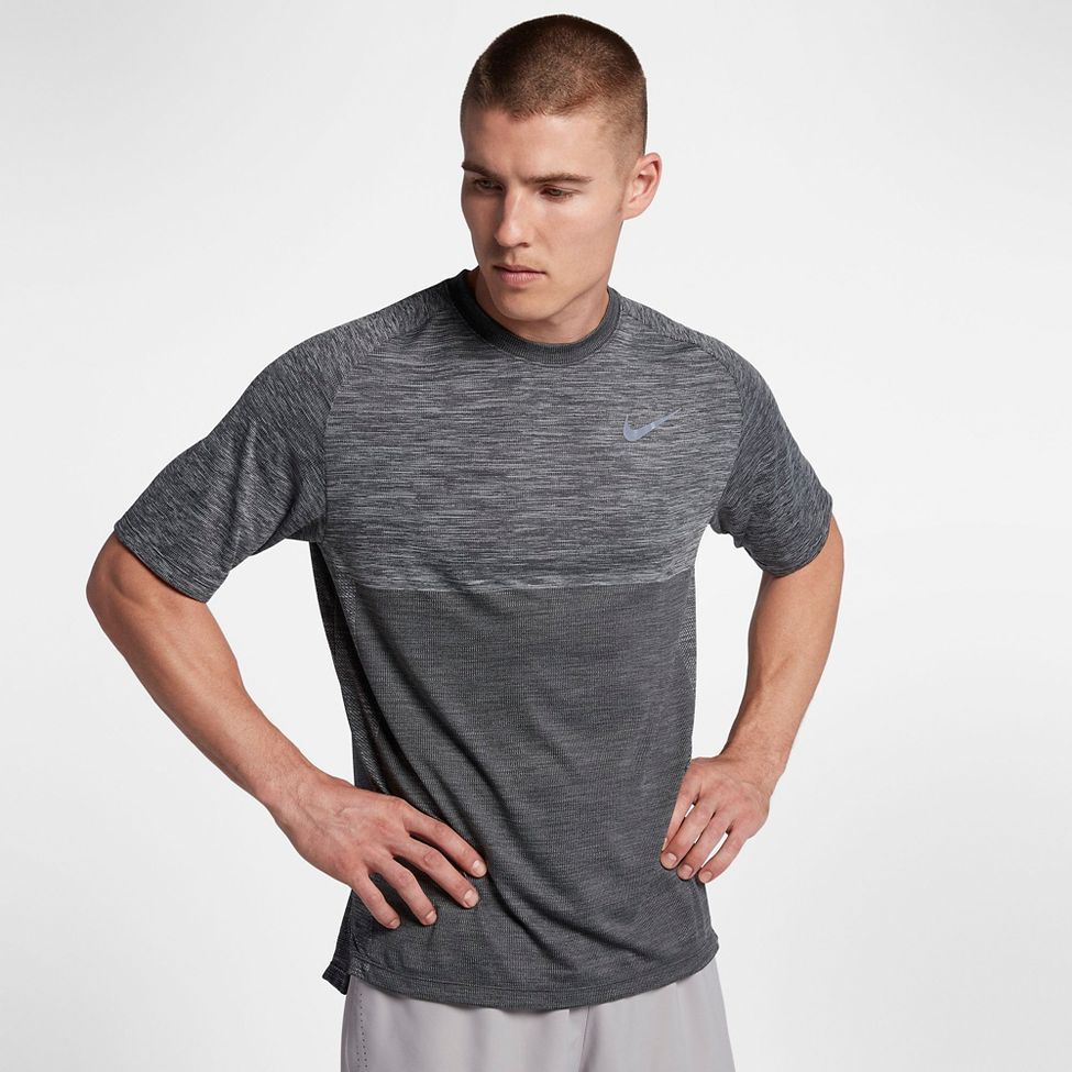 nike medalist running top